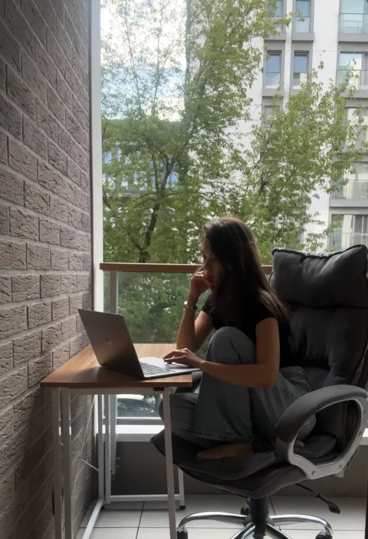 Sofia working on the balcony
